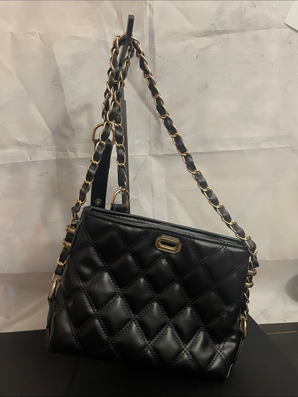 Elegant Black Quilted Crossbody Bag with Gold Chain Strap
